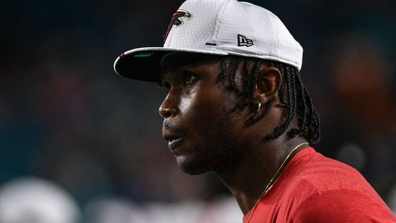 Julio Jones #11 of the Atlanta Falcons on the sideline during a preseason game against the Miami Dolphins at Hard Rock Stadium on Aug. 8, 2019 in Miami.