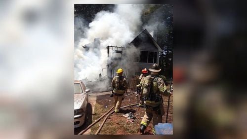 A man was killed Friday afternoon after getting trapped in the basement of a burning Lawrenceville home, authorities said.
