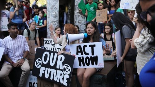 Youth led protesters demonstrate in front of the United Nations (UN) in support of measures to stop climate change during a weekly Friday gathering on August 30, 2019 in New York City. In Atlanta, students will strike outside of the state capitol on Friday, Sept. 20 and 27. (Photo by Spencer Platt/Getty Images)