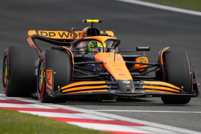 McLaren driver Lando Norris of Britain steers his car during qualifying at the Chinese Formula One Grand Prix at the Shanghai International Circuit, Shanghai, China, Saturday, April 20, 2024. (AP Photo/Andy Wong)