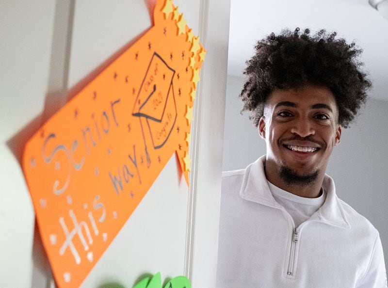 Cole Brown, a senior at South Gwinnett High School, woke up the first morning of school this year to find his family had decorated his bedroom door to make his senior year special despite attending virtually.  Ben Gray for the Atlanta Journal-Constitution