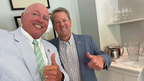 Kevin "Catfish" Jackson poses with Georgia Gov. Brian Kemp in a photo shared by Kemp on social media.