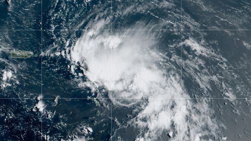 This satellite image released by the National Oceanic and Atmospheric Administration (NOAA) shows Tropical Storm Laura in the North Atlantic Ocean, Friday, Aug. 21, 2020. Laura formed Friday in the eastern Caribbean and forecasters said it poses a potential hurricane threat to Florida and the U.S. Gulf Coast. A second storm also may hit the U.S. after running into Mexico's Yucatan Peninsula.