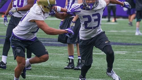 Cornerback Jordan Miller runs a drill during the University of Washington’s first spring football practice at Husky Stadium on Monday March 27, 2017. (Mike Siegel/The Seattle Times)