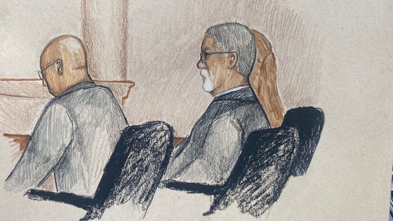 An artist's sketch of ex-Stonecrest Mayor Jason Lary (right) and attorney Dwight Thomas during Lary's sentencing hearing Wednesday, July 13, 2022, in U.S. District Court in Atlanta.