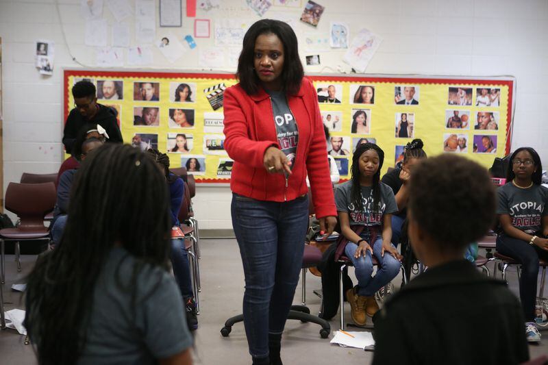 Tonia Jackson (center) provides direction to her students Kyla Bass (left) and Janaiya Turner (right) during an afternoon drama class at Utopian Academy for the Arts in Riverdale. Jackson, a co-star in the OWN television series “Greenleaf,” teaches drama at the school. HENRY TAYLOR / HENRY.TAYLOR@AJC.COM