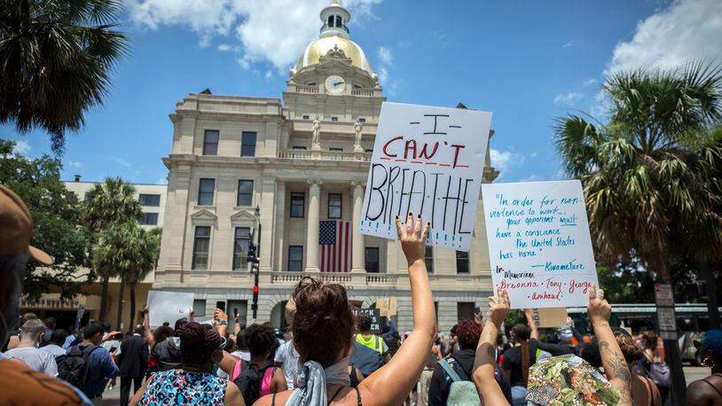 Nearly 1,000 protesters gather near City Hall on Sunday in  Savannah.