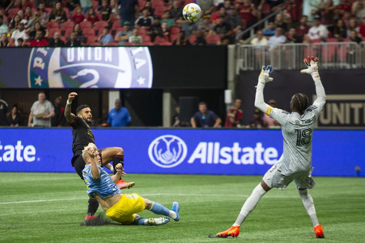 Dom Dwyer, forward for Atlanta United, makes a shot on Philadelphia Union goalie Andre Blake. CHRISTINA MATACOTTA FOR THE ATLANTA JOURNAL-CONSTITUTION.