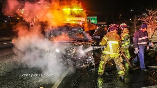 DeKalb County firefighters extinguished a car fire Thursday on I-285 West at Ashford Dunwoody Road.