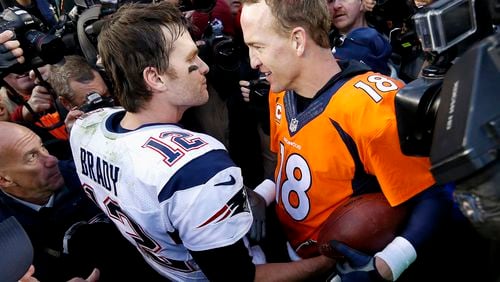 Tom Brady and Peyton Manning have met before in another venue - here the AFC Championship Game in January, 2016. They will not require padding when they compete again Sunday.  (AP Photo/David Zalubowski, File)