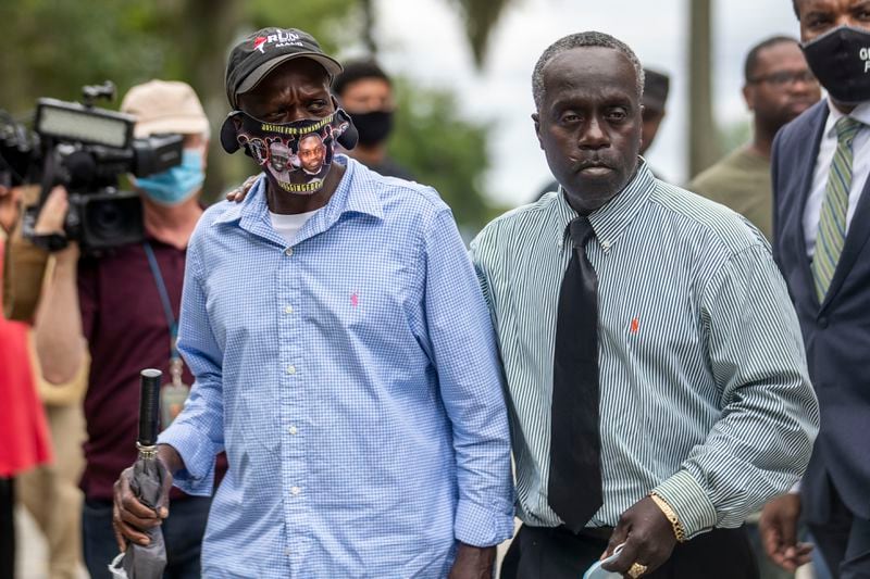 Marcus Arbery (right), father of Ahmaud Arbery, and Gary Arbery embraced as they are led away from the Glynn County Courthouse following a break from the proceedings in Brunswick Thursday, June 4, 2020. A judge found probable cause against three suspects in Ahmaud Arbery’s death.