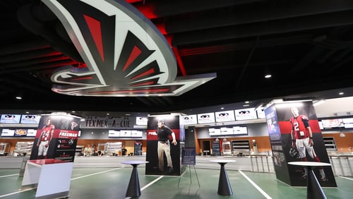 The 100 Yard Club features concession stands, bars and 11-foot-tall posters of Falcons players.