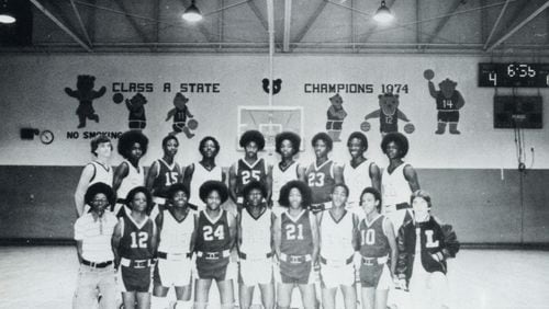 Mississippi’s Leland High School basketball team in the 1979 yearbook. Douglas Blackmon is far left on the back row. Blackmon's documentary, "The Harvest," depicts the integration of Leland's schools.