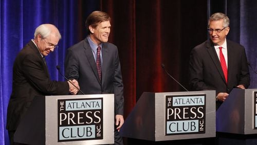 The candidates for Georgia Secretary of State shake hands after they held a debate at Georgia Public Broadcasting in Atlanta. The candidates are, from left, Democrat John Barrow, Libertarian Smythe DuVal and Republican Brad Raffensperger. The Atlanta Press Club debate will air on Georgia Public Broadcasting. BOB ANDRES / BANDRES@AJC.COM