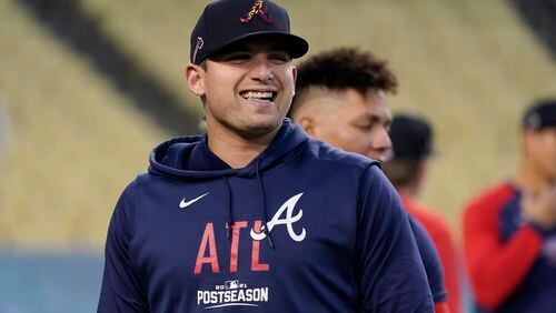 Austin Riley smiles during a workout ahead of Game 3 of baseball's National League Championship Series, Monday, Oct. 18, 2021, in Los Angeles.