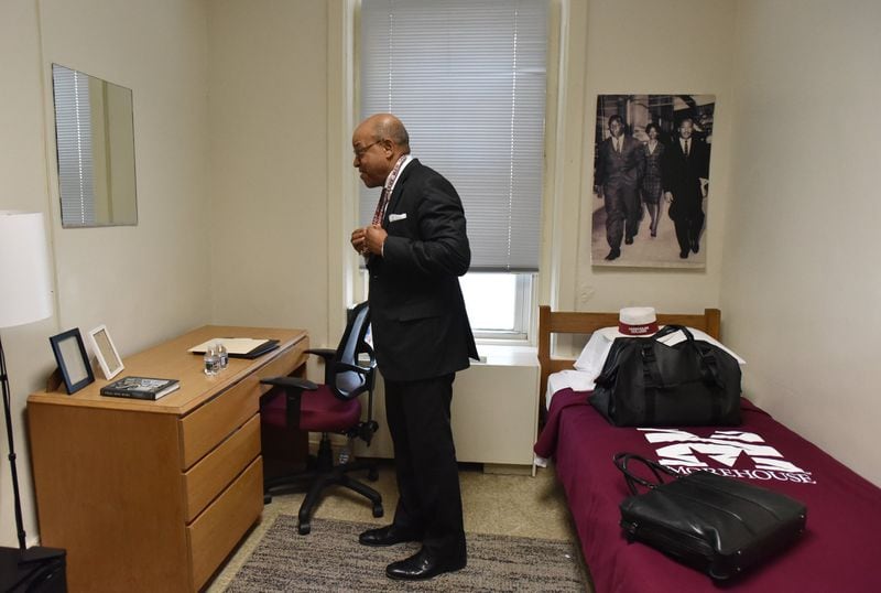 Morehouse President David A. Thomas wears a neck keychain with his room key after he moved into his room at historic Graves Hall in Morehouse College on Aug. 7. Thomas moved into a dormitory for two days, his way of launching a historic capital campaign to raise money for student scholarships so deserving students will not be shut out of a Morehouse education because they can’t afford tuition. HYOSUB SHIN / HSHIN@AJC.COM