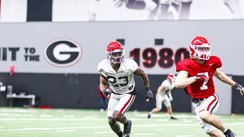 Georgia defensive back Tykee Smith (23) defends a scout-team receiver (7) during the Bulldogs' practice Tuesday, Oct. 5, 2021, at the Payne Athletic Center in Athens. (Tony Walsh/UGA Athletics)