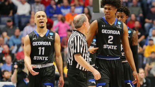 Isaiah Williams (left) and Malik Benlevi of the Georgia State Panthers react to a call during Friday's NCAA tournament opener against Cincinnati. Georgia State, the Sun Belt Conference champion and a No. 15 seed in the South Region, was eliminated after its 68-53 loss to the No. 2 seeded Bearcats. (Frederick Breedon/Getty Images)
