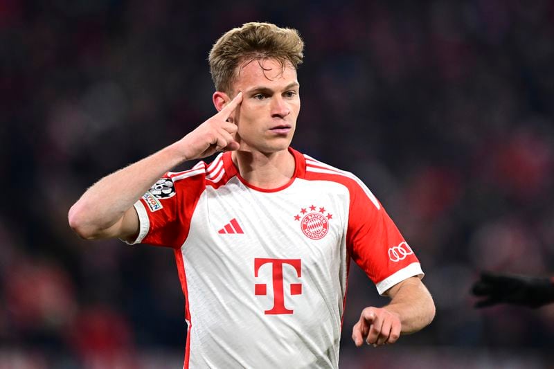Bayern's Joshua Kimmich celebrates after scoring his side's opening goal during the Champions League quarter final second leg soccer match between Bayern Munich and Arsenal at the Allianz Arena in Munich, Germany, Wednesday, April 17, 2024. (AP Photo/Christian Bruna)