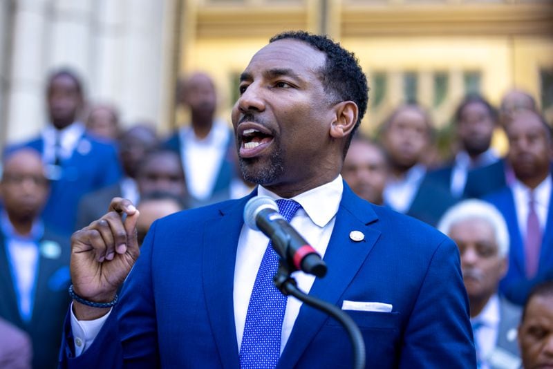 Mayor Andre Dickens speaks at an April news conference in front of Atlanta City Hall about the proposed Atlanta Public Safety Training Center, which he supports. (Arvin Temkar/The Atlanta Journal-Constitution)