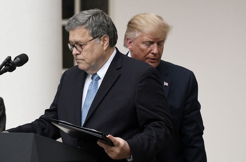 President Donald Trump and U.S. Attorney General William Barr look on during a news conference about U.S. citizenship status for the upcoming 2020 census in the Rose Garden at the White House on Thursday, July 11, 2019, in Washington, D.C. (Olivier Douliery/Abaca Press/TNS)