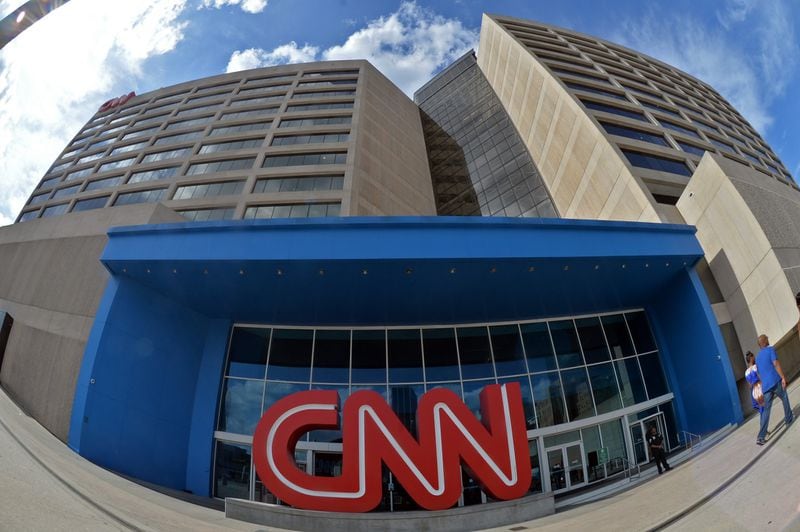Employees at CNN and other units of Turner Broadcasting in Atlanta are closer to becoming part of AT&T. A federal judge shot down Justice Department efforts to block the telecommunications company from buying Time Warner, which owns Turner as well as HBO and Warner Bros. HYOSUB SHIN / HSHIN@AJC.COM