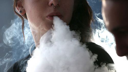 An ordinance that would ban vape shops has been accepted on first reading by the Alpharetta City Council. AJC FILE/JUSTIN SULLIVAN/GETTY IMAGES