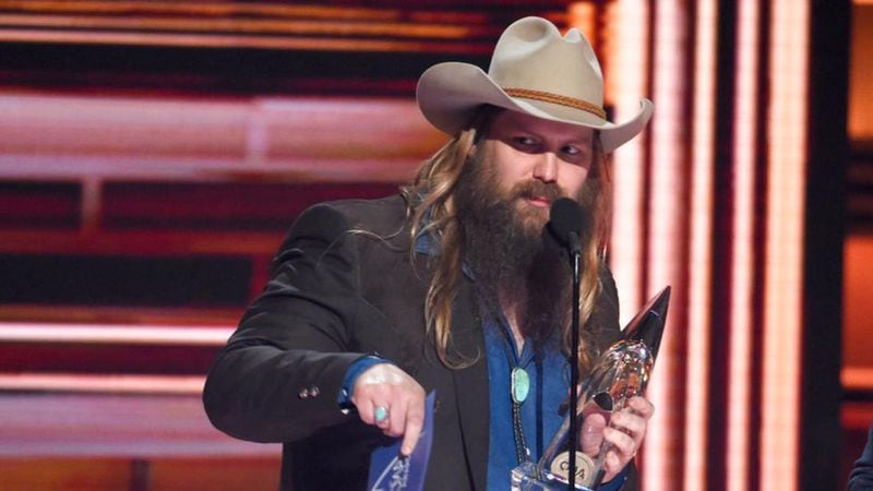 Chris Stapleton accepts the award for album of the year "From A Room: Volume 1" at the 51st annual CMA Awards at the Bridgestone Arena on Wednesday, Nov. 8, 2017, in Nashville, Tenn.