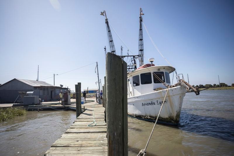Shrimp boats sit along docks on Lazaretto Creek on Tybee Island. A quarantine station for enslaved African sickened during their trans-Atlantic voyage once stood nearby. (AJC Photo/Stephen B. Morton)