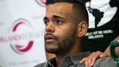 ORLANDO, FL - JUNE 14: Angel Colon, who was injured in the Pulse Nightclub shooting, is comforted by siblings during a press conference at Orlando Regional Medical Center, June 14, 2016 in Orlando, Florida. The shooting at Pulse Nightclub, which killed 49 people and injured 53, is the worst mass-shooting event in American history. (Photo by Drew Angerer/Getty Images)