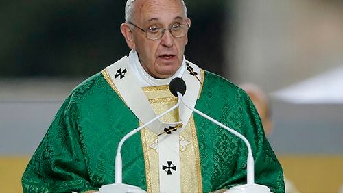 Pope Francis delivers his homily while celebrating Mass Sunday, Sept. 27, 2015, in Philadelphia. (AP Photo/Matt Slocum)