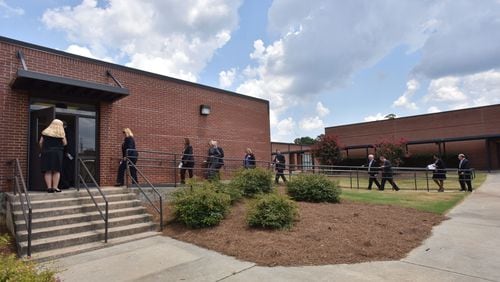 July 21, 2016 Duluth - School officials tour Coleman Middle School on Thursday, July 21, 2016. Coleman Middle School and Baldwin Elementary School are two new Gwinnett schools opening this fall. Both schools have scheduled a â€œMeet Your Teacherâ€ event on Aug. 4. Classes start on Monday, Aug. 8. HYOSUB SHIN / HSHIN@AJC.COM