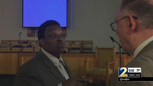 Local pastor Alfred T. Lance and Poston Road Baptist Church Elder Pete Maynard bump heads over bylaws. (Credit: Channel 2 Action News)