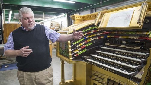 To construct a stand-in console for the Might Mo organ, Arthur Schlueter III and his colleagues took hundreds of measurements, built a 3-D digital version in a computer, and then a full-size paper mockup, before assembling a replacement instrument. (ALYSSA POINTER/ALYSSA.POINTER@AJC.COM)