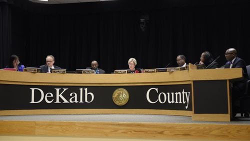 The DeKalb County Board of Commissioners votes on a plan to redevelop the General Motors plant located in Doraville during a meeting Tuesday. The motion was approved unanimously. (DAVID BARNES / DAVID.BARNES@AJC.COM)