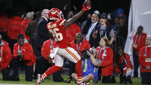 Kansas City Chiefs' Damien Williams (26) scores the final touchdown of Super Bowl 54 Sunday, Feb. 2, 2020, in Miami Gardens, Fla.