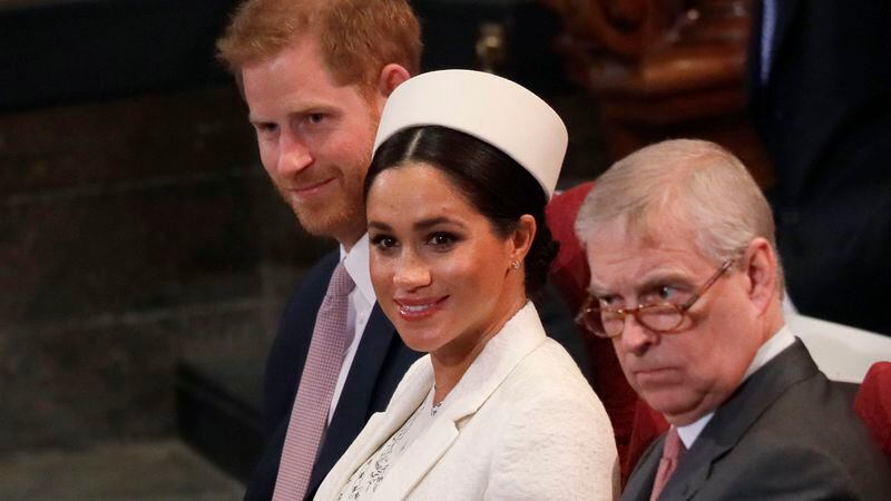 Meghan, Duchess of Sussex sits with Prince Harry, left, and Prince Andrew, right, during the Commonwealth Service at Westminster Abbey in London, Monday, March 11, 2019.
