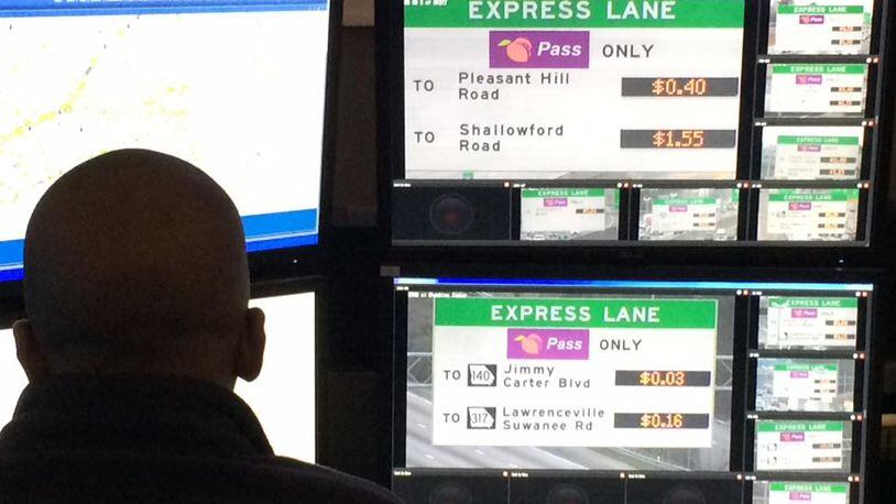 An operator at GDOT's Transportation Management Center monitors the I-85 express lanes. Operators there will soon be controlling the new I-75 reversible express lanes in Clayton and Henry counties.