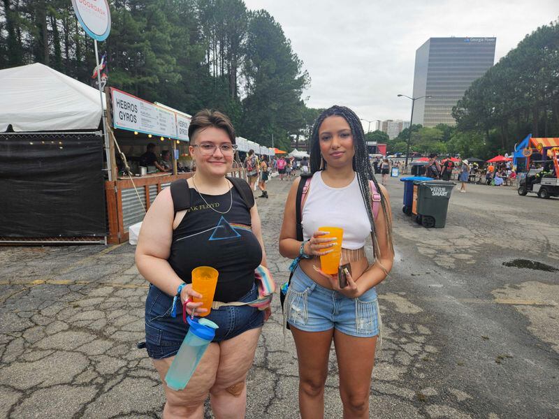 Kaitlin Blalack (left) and Amber Reum get their day started at Shaky Knees. (DeAsia Paige/The Atlanta Journal-Constitution)