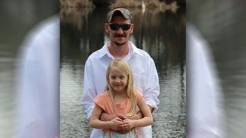 The Department of Natural Resources is investigating whether Kim Drawdy, 30, and his daughter were wearing blaze orange safety gear when they were shot on New Year’s Day.