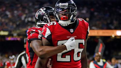 Atlanta Falcons running back Tevin Coleman (26) celebrates his touchdown during the second half of an NFL football game against the New Orleans Saints in New Orleans, Monday, Sept. 26, 2016. (AP Photo/Butch Dill)