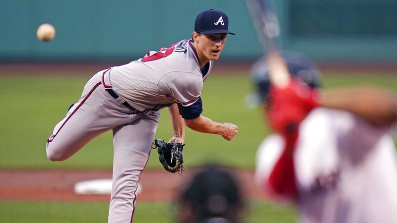 Atlanta Braves starting pitcher Kyle Wright delivers during the first inning of the team's baseball game against the Boston Red Sox, Wednesday, Aug. 10, 2022, in Boston. (AP Photo/Charles Krupa)