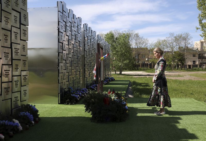 Britain's Sophie, Duchess of Edinburgh, visits the memorial to the victims of the Russian occupation in the town of Bucha, Ukraine, Monday, April 29, 2024. (Anatolii Stepanov/Pool via AP)