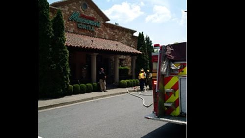 Romano's Macaroni Grill at the Mall of Georgia caught fire Monday afternoon, damaging a wall.