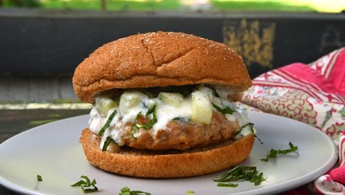 This Chicken Burgers with Tzatziki recipe produces four burgers. (Chris Hunt for The Atlanta Journal-Constitution)