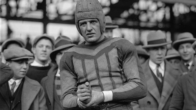 Red Grange on the sideline during one of the NFL games he played as a Chicago Bear in late 1925. (Photo courtesy Library of Congress/TNS)