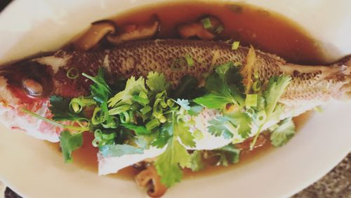 Talat Market’s “pla neung see ew” is a whole black sea bass with a broth of soy sauce, ginger, scallions, garlic and shiitakes. CONTRIBUTED BY BRANDI SUPRATANAPONGSE
