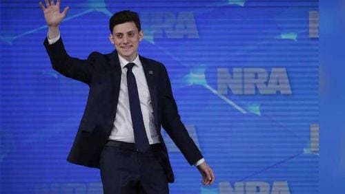 In this April 26, 2019 file photo, Kyle Kashuv, a survivor of the Marjory Stoneman Douglas High School shooting in Parkland, Fla., speaks at the National Rifle Association Institute for Legislative Action Leadership Forum in Indianapolis.