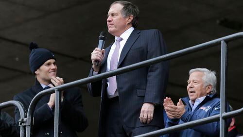 New England Patriots head coach Bill Belichick, center, addresses a crowd of supporters during an NFL football send-off rally at City Hall in Boston Monday, Jan. 26, 2015. The Patriots play the Seattle Seahawks in Sunday's Super Bowl XLIX in Glendale, Ariz. At left is Patriots quarterback Tom Brady, at right is Patriots owner Robert Kraft. (AP Photo/Charles Krupa) New England's three heads of state -- Tom Brady, Bill Belichick and Robert Kraft -- spoke at Monday's rally in Boston. (AP photo)
