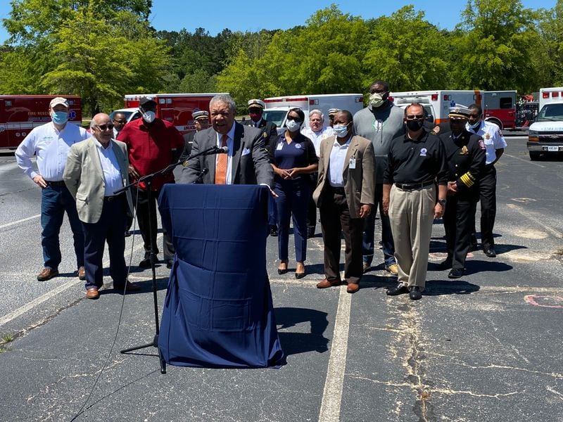 Fulton County Commission Chairman Robb Pitts speaks during a media event on Friday, May 1, 2020 to celebrate Fulton leasing six medical first responder units to help the cities of southern Fulton respond to the COVID-19 pandemic. The event was held in the parking lot of the Wolf Creek Amphitheater, which is a coroanvirus testing site. (Ben Brasch/AJC)